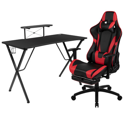 Black gaming desk and red/black gaming chair with footrest set by Start2Finish, featuring ergonomic design and modern style.