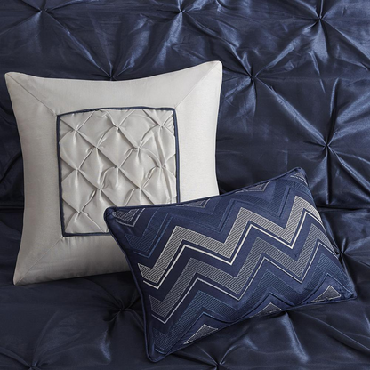 Start2Finish Laurel 7-piece navy tufted comforter set with matching pillow shams and bed skirt for a stylish bedroom look.