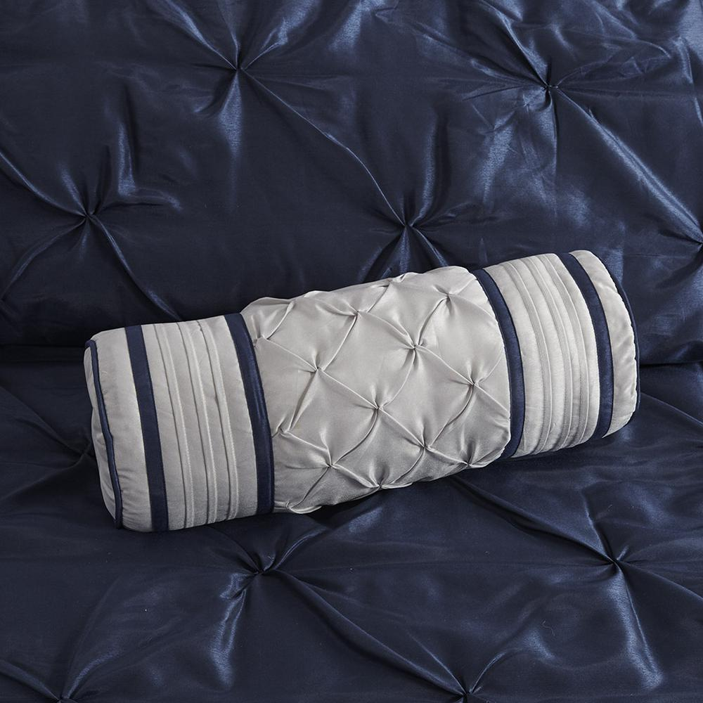 Start2Finish Laurel 7-piece navy tufted comforter set with matching pillow shams and decorative pillows on a bed.