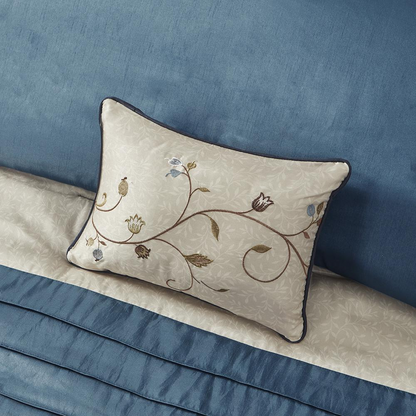 Start2Finish Serene Embroidered 7-Piece Comforter Set in navy with floral embroidery details on the comforter and matching pillow shams.