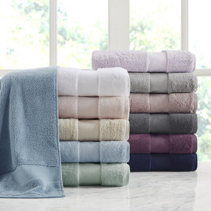 Start2Finish cotton 6-piece bath towel set featuring soft, plush towels in neutral colors, neatly folded for display.