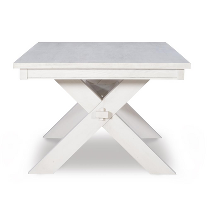 Distressed white dining table by Start2Finish, showing a wooden table with a rustic finish and sturdy legs for dining room use.