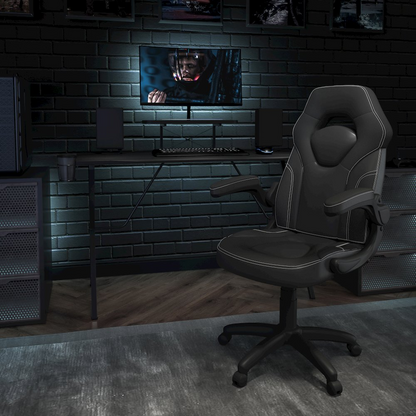 Black gaming desk and racing chair set by Start2Finish, featuring a spacious desk surface and ergonomic racing-style chair.