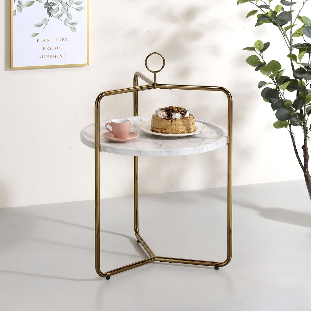 White and gold Miro side table by Start2Finish featuring a sleek round top and modern gold legs.