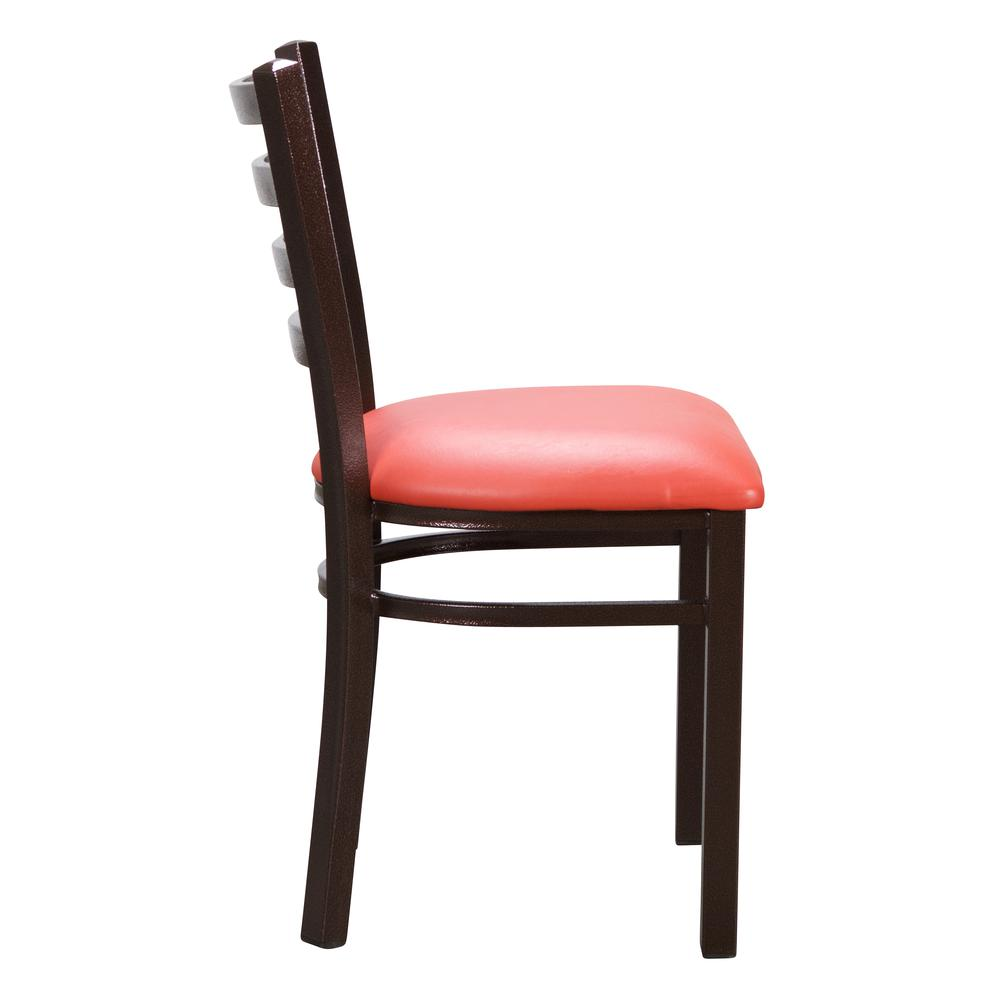Two red Baxter metal side chairs from Start2Finish with sleek frames and contoured seats, set against a neutral background.