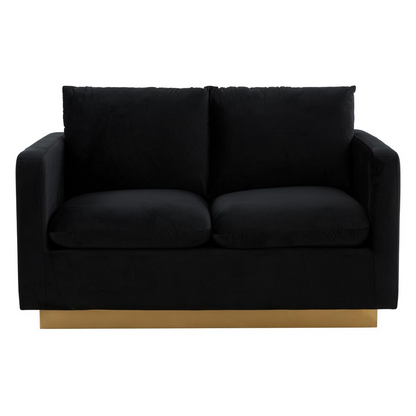 Nervo velvet loveseat with gold frame, modern mid-century design, upholstered in plush fabric, featuring sleek gold metal legs.