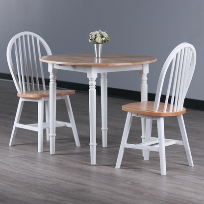 Sorella 3-piece drop leaf dining table with Windsor chairs in natural wood and white finish, ideal for small dining spaces.