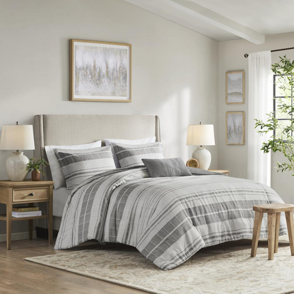 Start2Finish 4-piece stripe comforter set with matching throw pillow on bed, featuring bold striped pattern and soft fabric.