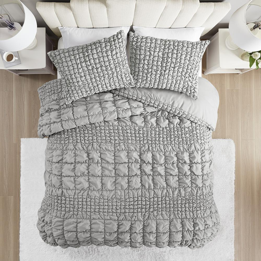 Start2Finish Evelyn 3-piece stripe ruched comforter set in grey on a bed with matching pillow shams.