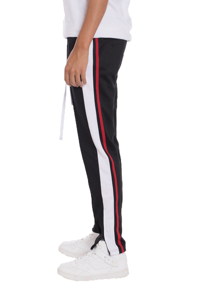 Lime Milo tricot sweat pants with elastic waistband and relaxed fit, shown on a model for comfortable casual wear.