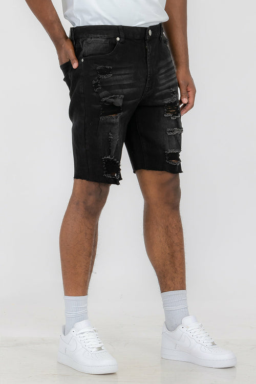 Black washed distressed denim shorts for men by Lime Milo, showing frayed edges and casual fit.