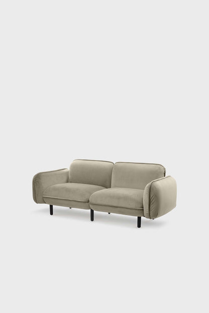Beige bean sofa by Aquamarine Poppy showing plush fabric cushions and modern furniture design.