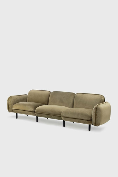 Green Bean Sofa by Aquamarine Poppy, modern furniture piece with plush cushions and a stylish design, shown in a contemporary living room setting.