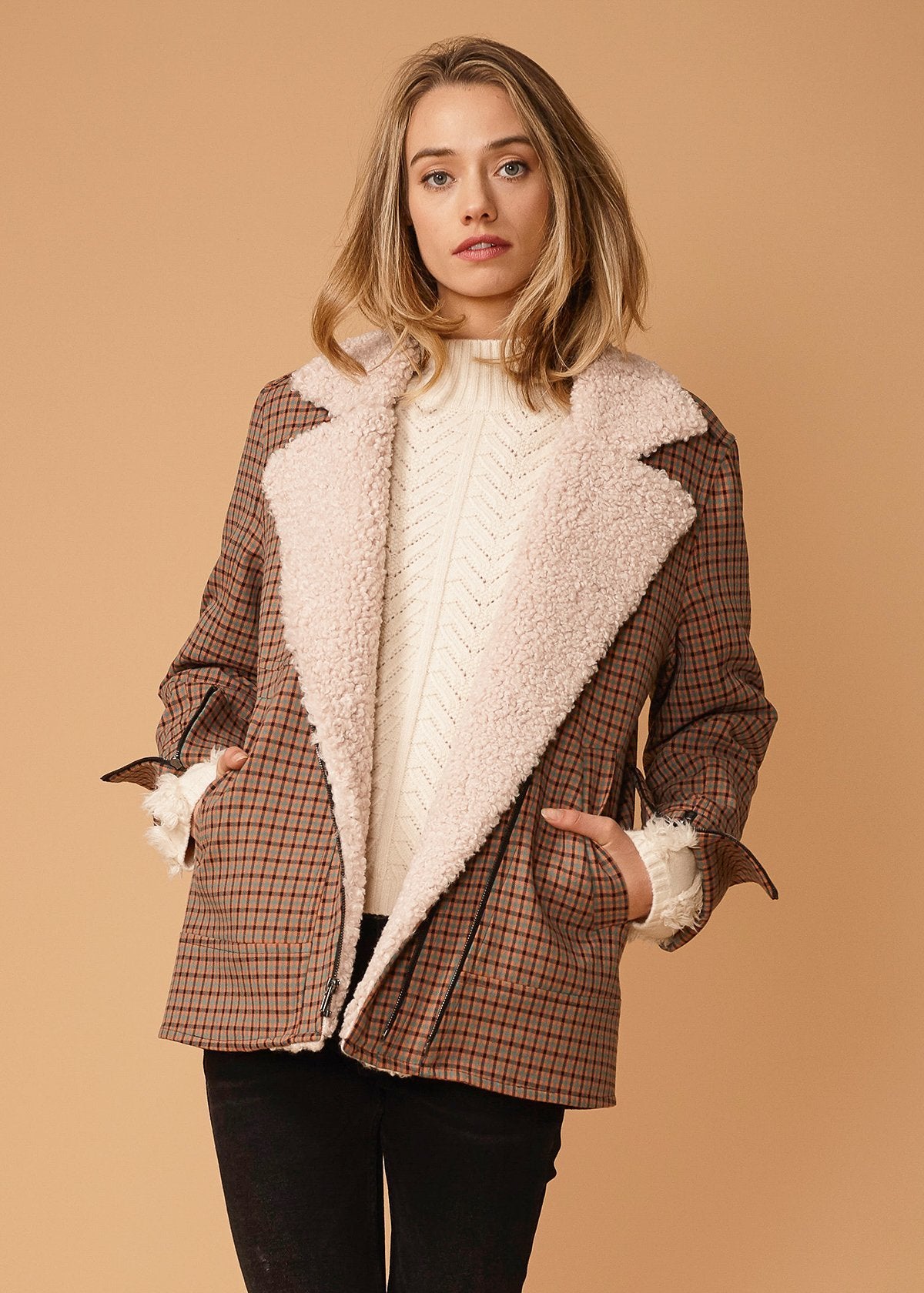 Lemon Hera asymmetrical zip front coat in peach gingham pattern, stylish jackets and coats with a modern design.