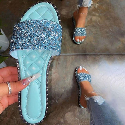Crystal women’s slippers by Coffee Jasper featuring bling bling flats, comfortable beach shoes for summer with sparkling embellishments.