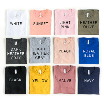 Agate Life’s a Beach Enjoy The Waves T-shirt with ocean wave graphic in bright colors, casual cotton fabric, front view.