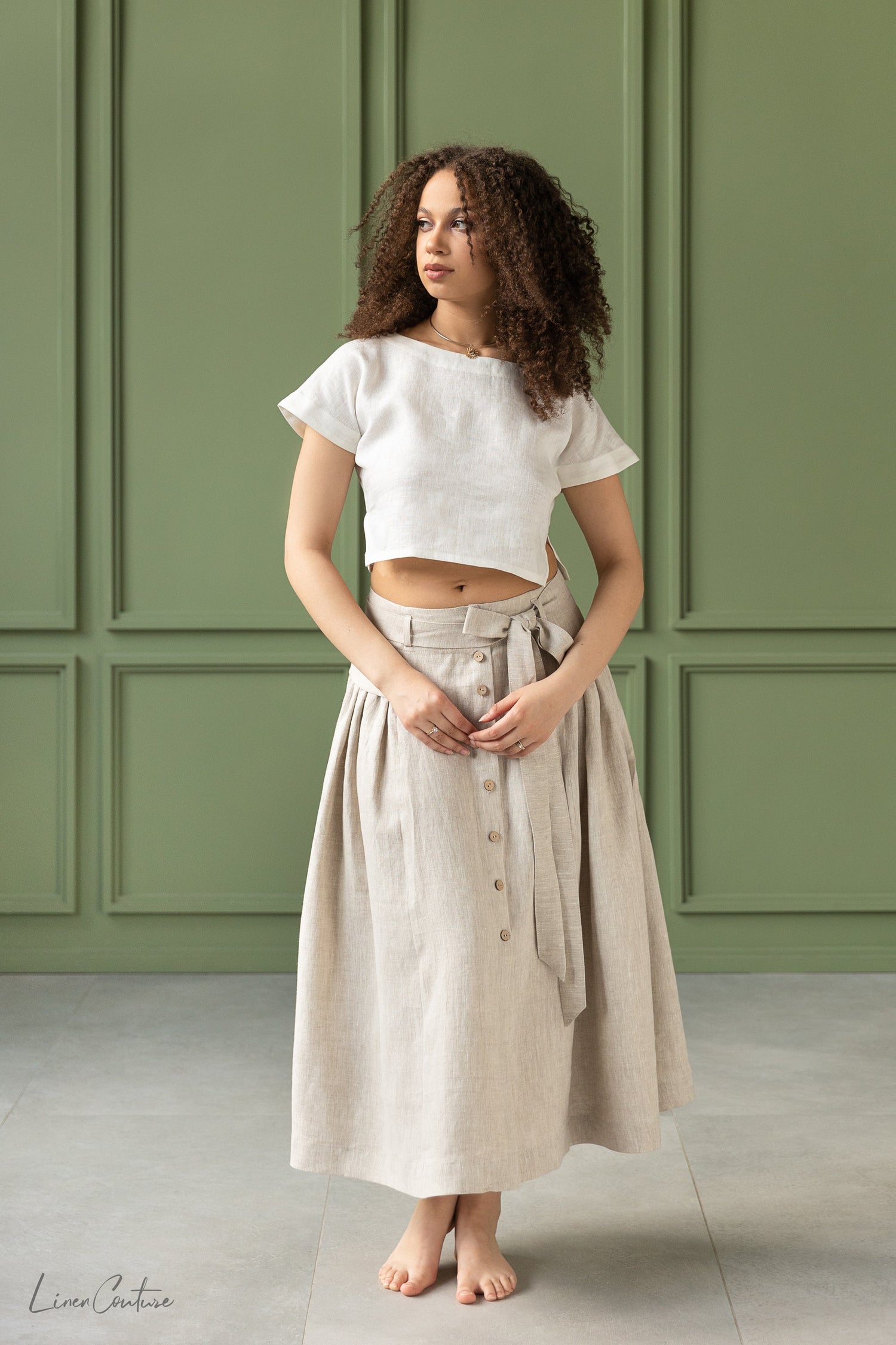 Magenta Sugarplum Taormina Set featuring a linen crop top and flared midi skirt, shown in a stylish matching ensemble.