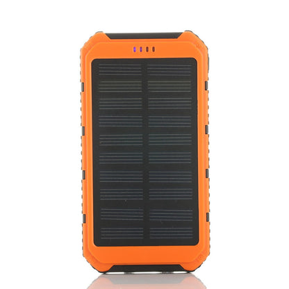 Salmon Lucky Roaming Solar Power Bank charging a phone, portable solar-powered tech accessory for phones and tablets.