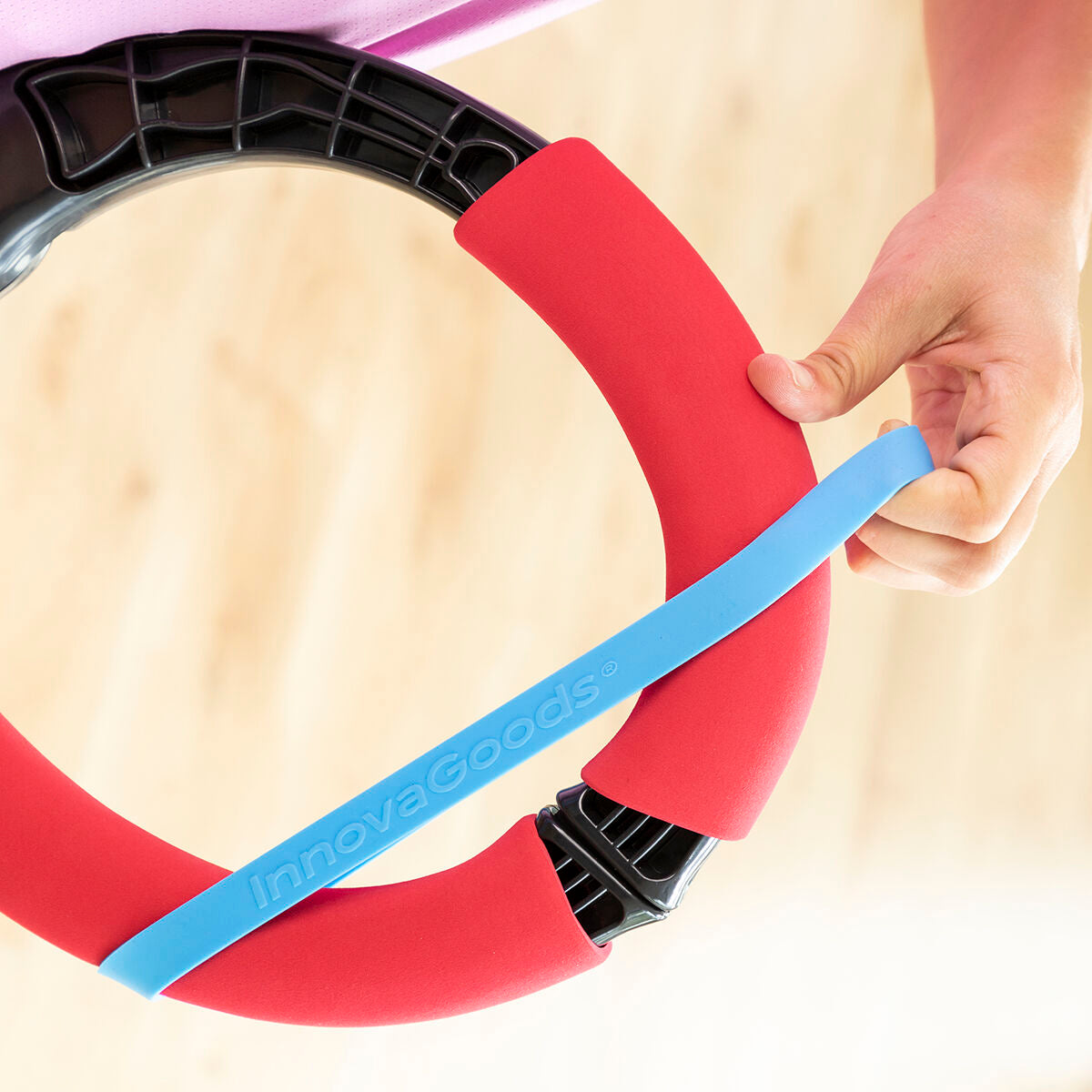 Adjustable arm exerciser with resistance bands and exercise guide by Bigbuy for strength training and physical fitness.