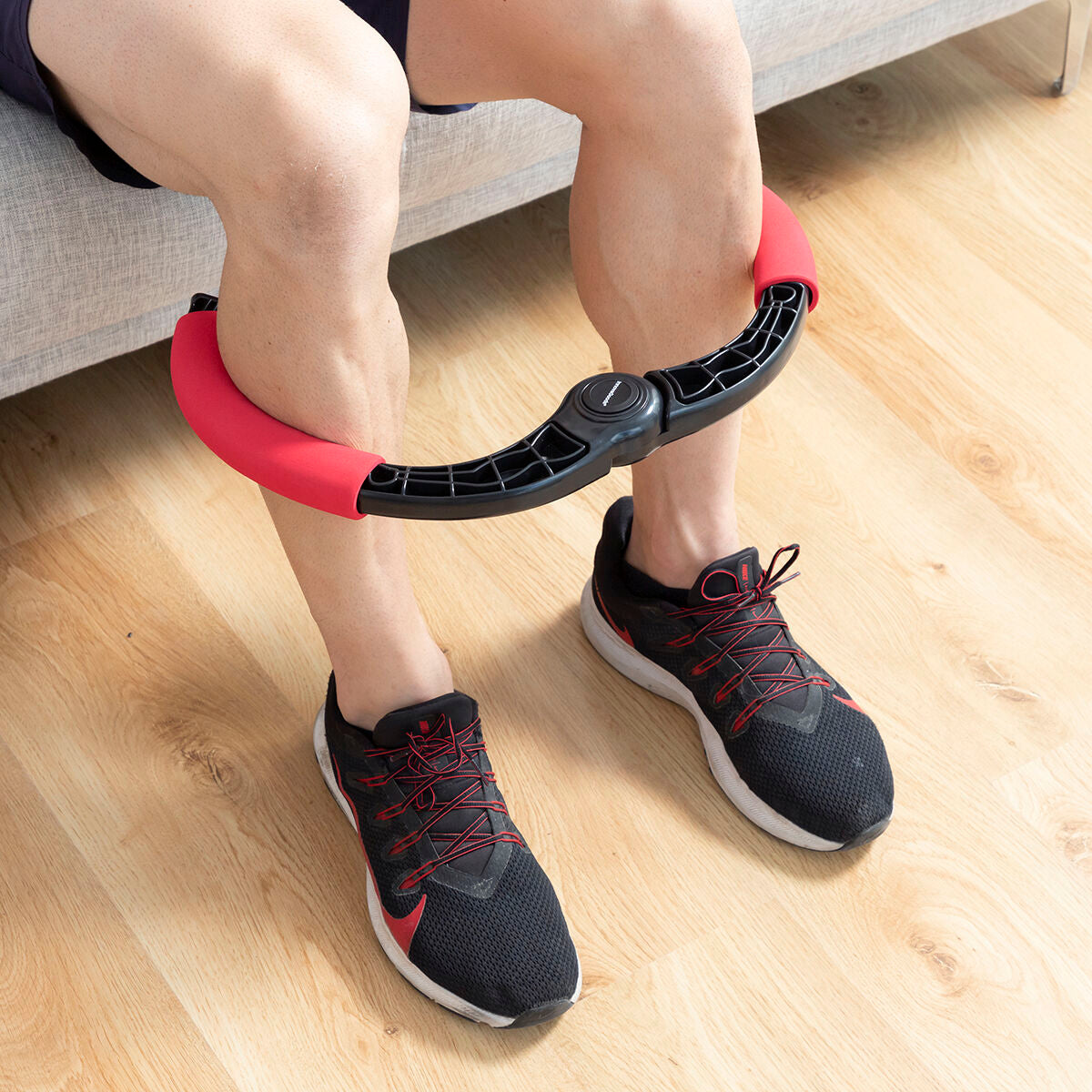 Adjustable arm exerciser with resistance bands and exercise guide from Bigbuy, used for strength training and fitness workouts.