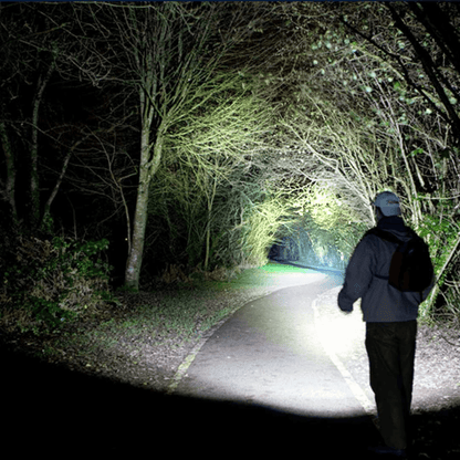 Black Lavender EcoGear FX TK120 LED tactical flashlight with strobe mode, designed for camping and outdoor use.