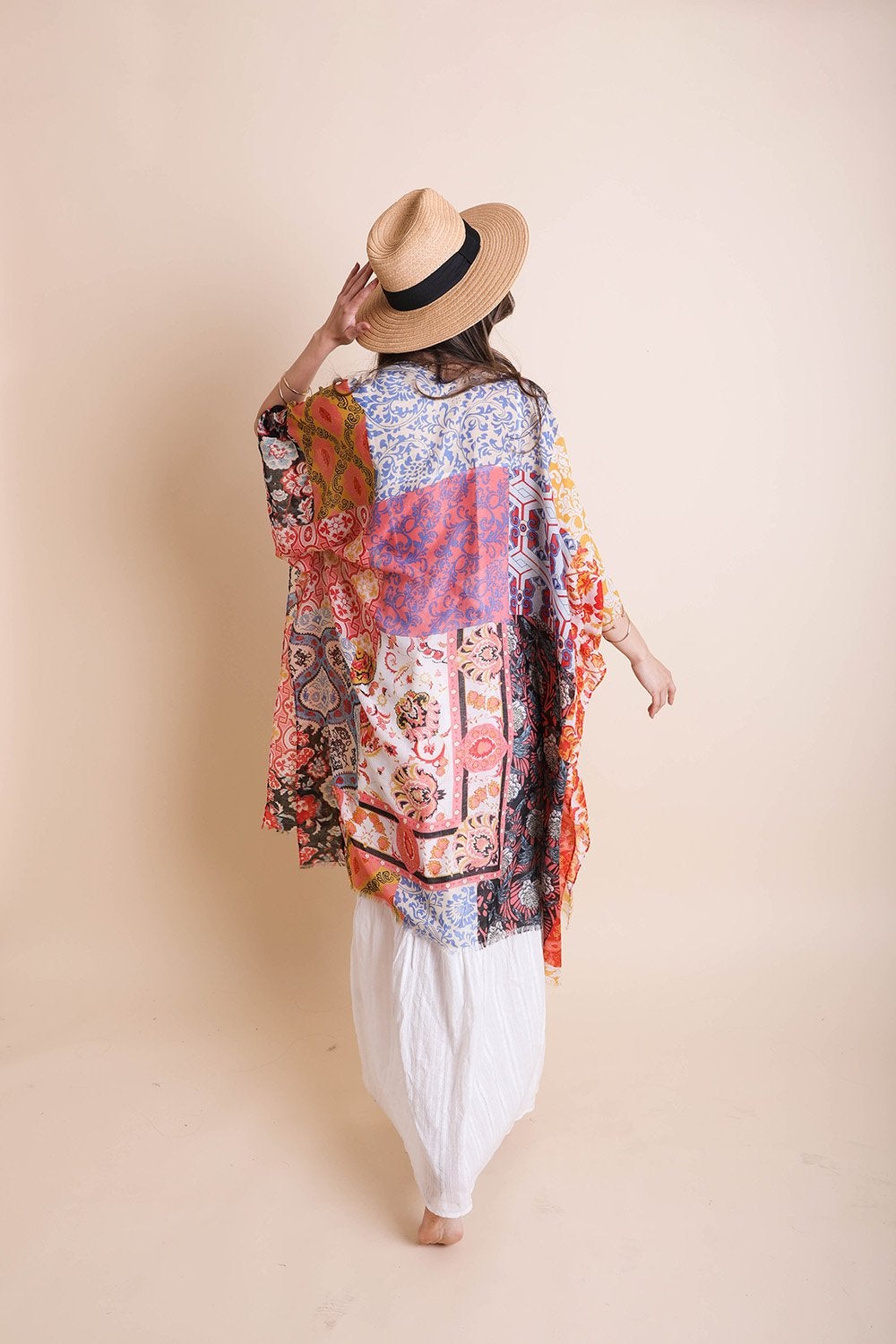 Boho Patchwork Kimono from Periwinkle Aether, featuring colorful patchwork design and flowing bohemian style accessory.