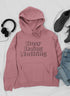 Mauve Jade Thalassa T-shirt featuring the "Busy Doing Nothing" slogan in bold white lettering on soft cotton fabric.