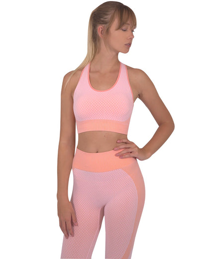 Lazurite Trois Seamless Pink Sports Bra for activewear, shown on a white background with a snug, supportive fit.