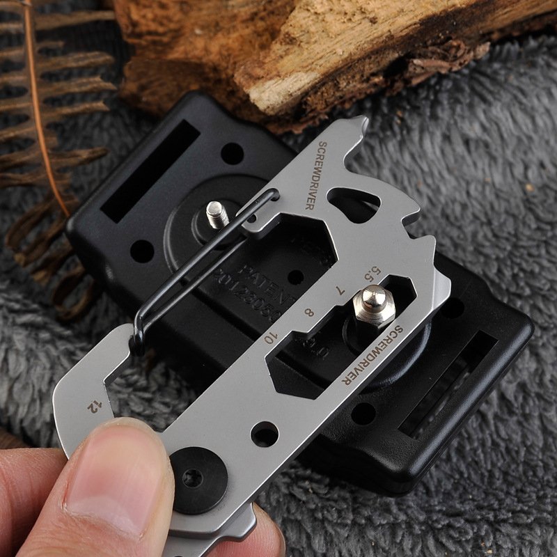 Fuchsia Molly 14-in-1 outdoor camping multi-tool with various functions, shown open with tools extended for versatile outdoor use.
