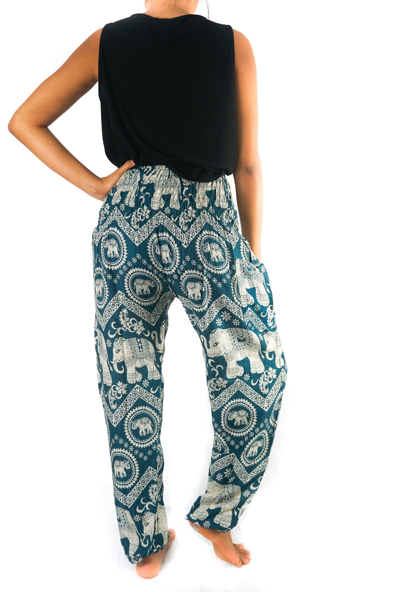 Teal Elephant print boho pants for women, hippie style yoga pants by Tan Smokey with relaxed fit and vibrant design.