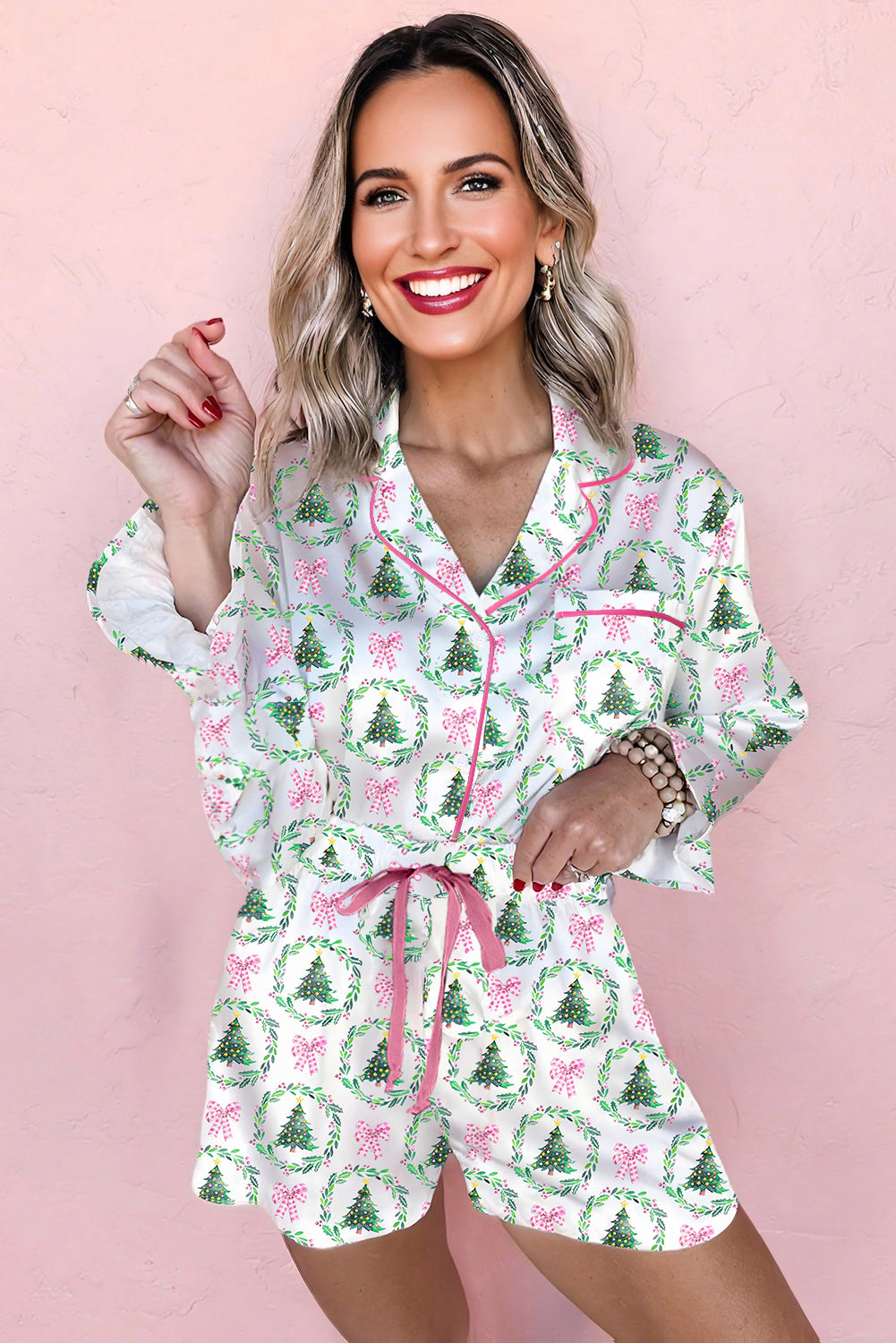 Byzantium Bay Christmas velvet trim pajama set featuring a long-sleeve top and matching shorts with festive red and green accents.