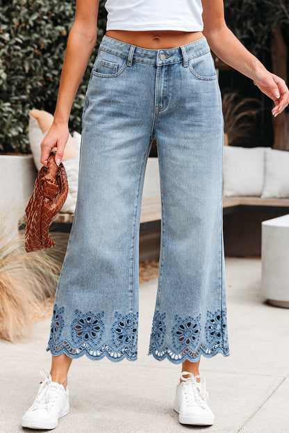 Byzantium Bay solid denim embroidered wide-leg jeans featuring detailed embroidery and a relaxed fit.