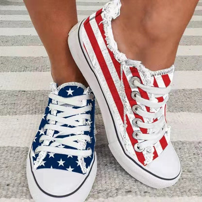 Silver Juneberry star striped lace-up flats with round toe design, casual sneakers with a stylish star pattern and comfortable fit.