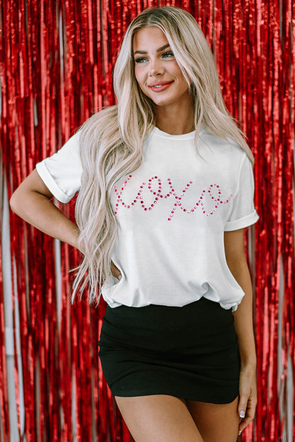 White rhinestone XOXO Valentine tee from Harlequin Daisy, featuring a stylish bath and beauty-themed design with sparkling accents.