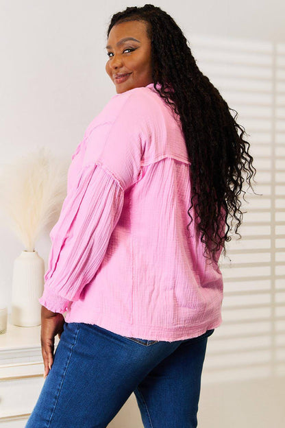 Carmine Juneberry double take exposed seam buttoned notched neck blouse, shown with front view, in a stylish women’s top and blouse.