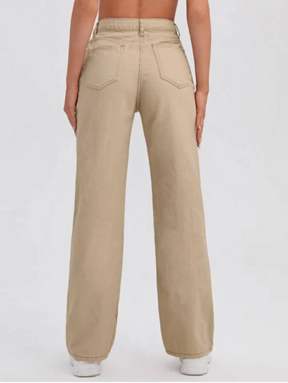 Women’s beige high-rise denim jeans by Ochre Ourea, size 32, shown folded with front pockets and belt loops.