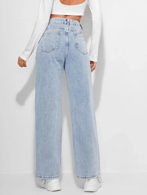 Light blue high rise denim jeans for women by Ochre Ourea, size 32, shown on a model.