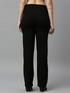 Black women’s high rise denim jeans by Ochre Ourea, size 32, displayed on a model, showcasing a fitted silhouette and classic style.