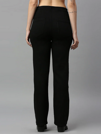 Women’s high rise black denim jeans by Ochre Ourea, size 30, showing the fit and classic style of the denim fabric.