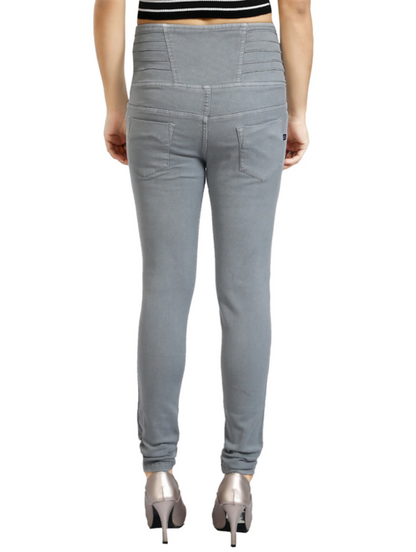 Women’s high rise denim jeans in grey by Ochre Ourea, size 32, displayed on a model showing the front fit and style.