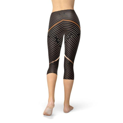 Women’s striped brown Capri leggings by Maroon Sooty, featuring a sporty design with horizontal lines and a fitted style.
