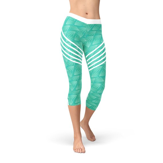 Maroon Sooty turquoise sports capri leggings with elastic waistband, shown on a model for active wear or workout attire.
