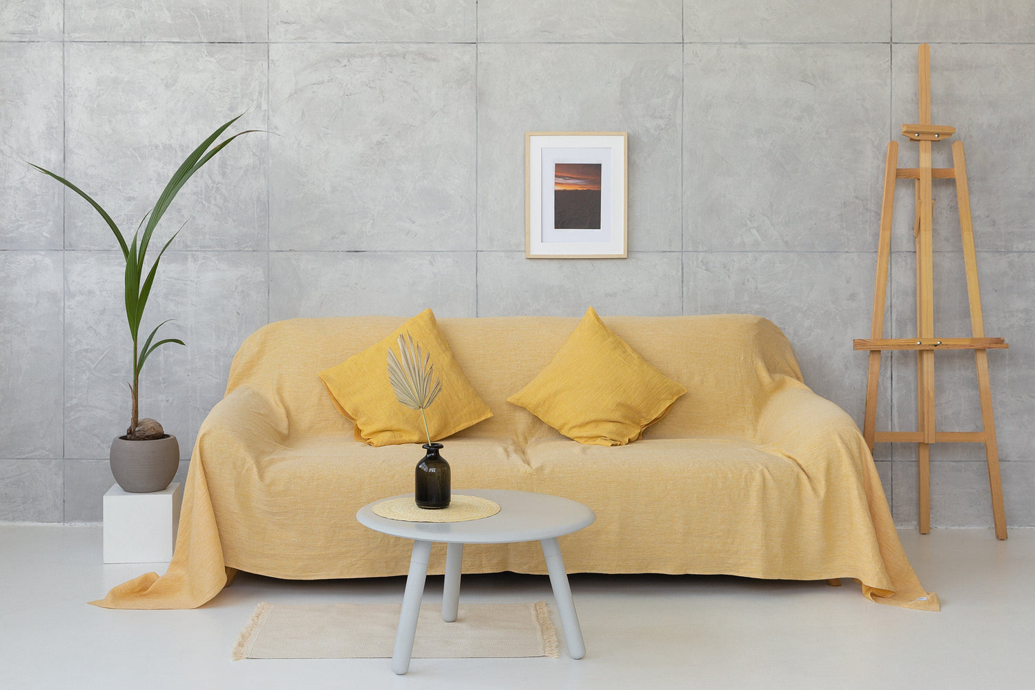Reddish brown linen couch cover by Magenta Sugarplum, stylish home decor for sofa protection and aesthetic enhancement.