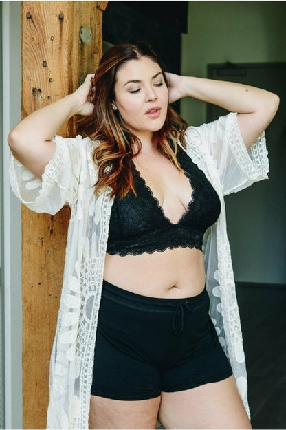 Black Plus Halter Top Bralette from Periwinkle Aether, featuring a supportive halter design and soft fabric.