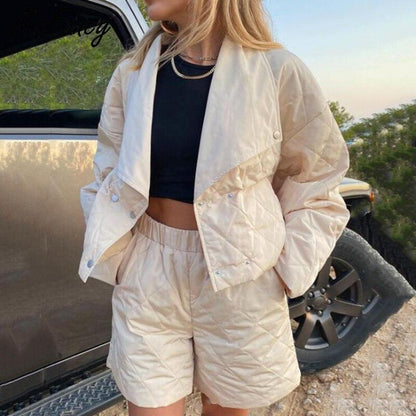 Grey Beech quilted high waist shorts and matching crop jacket set, with textured fabric and stylish design.