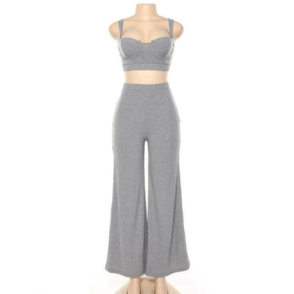 White two-piece knitted tracksuit for women by Blue Charlie, sleeveless strapless crop top and matching pants.