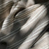 Ariel woven stripe Turkish throw blanket with slate and salt-colored stripes, perfect for cozy home decor.
