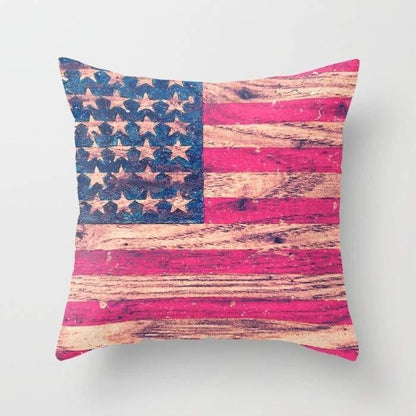 Vintage pink patriotic American flag pillow by Scorpius featuring retro wood design and classic textile details.